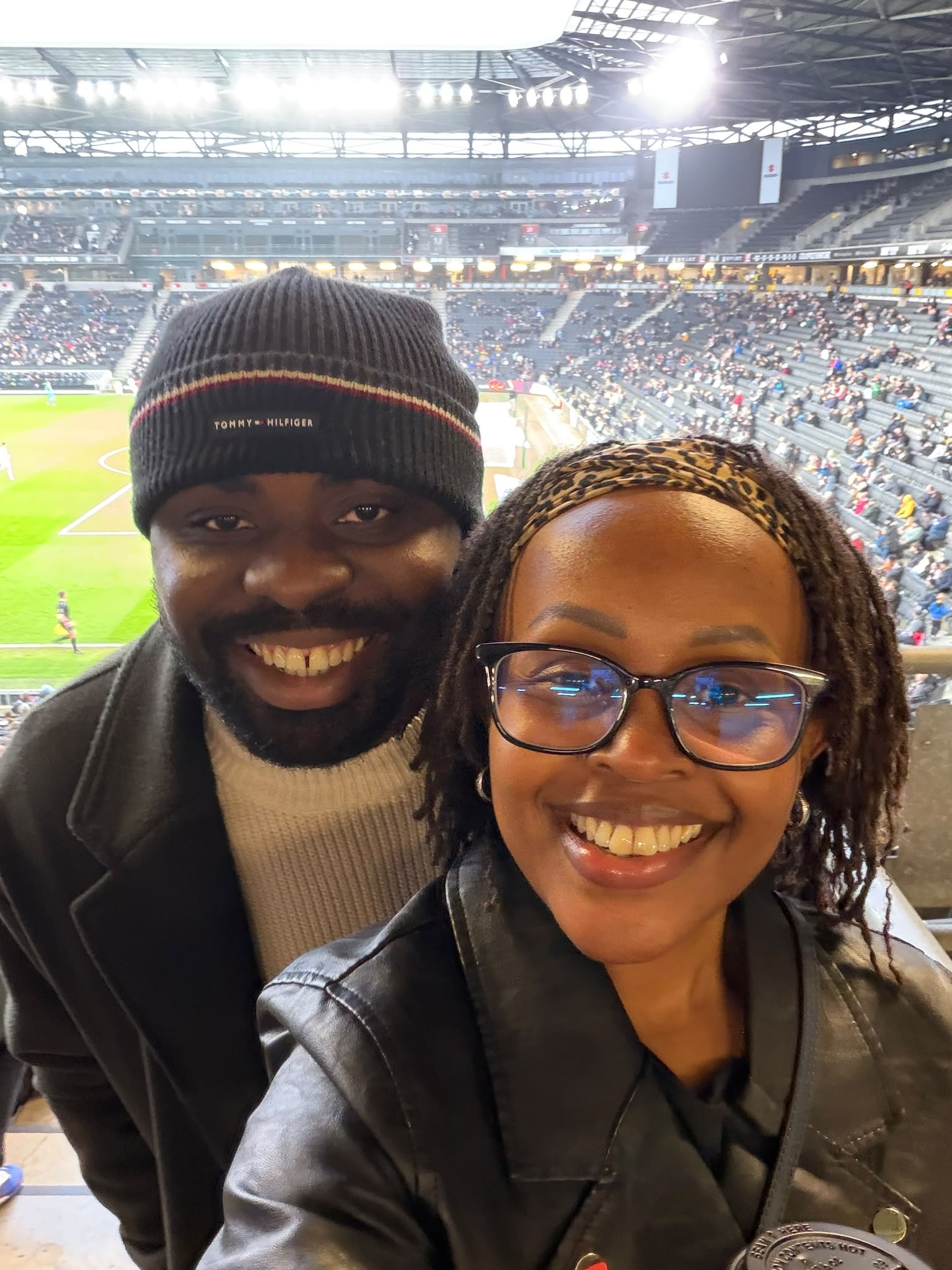 Leo and Njoki at the stadium